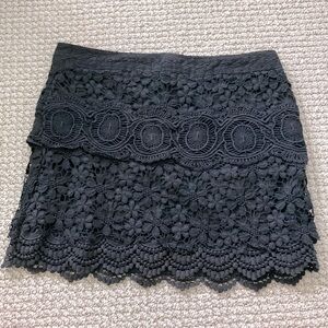 EUC Vintage Free People black crochet mini skirt. (Size 2)